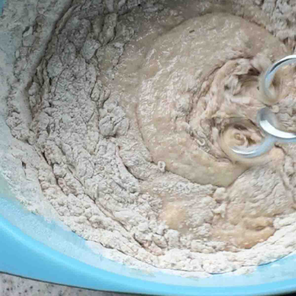 Kneading yeast dough with mixer.